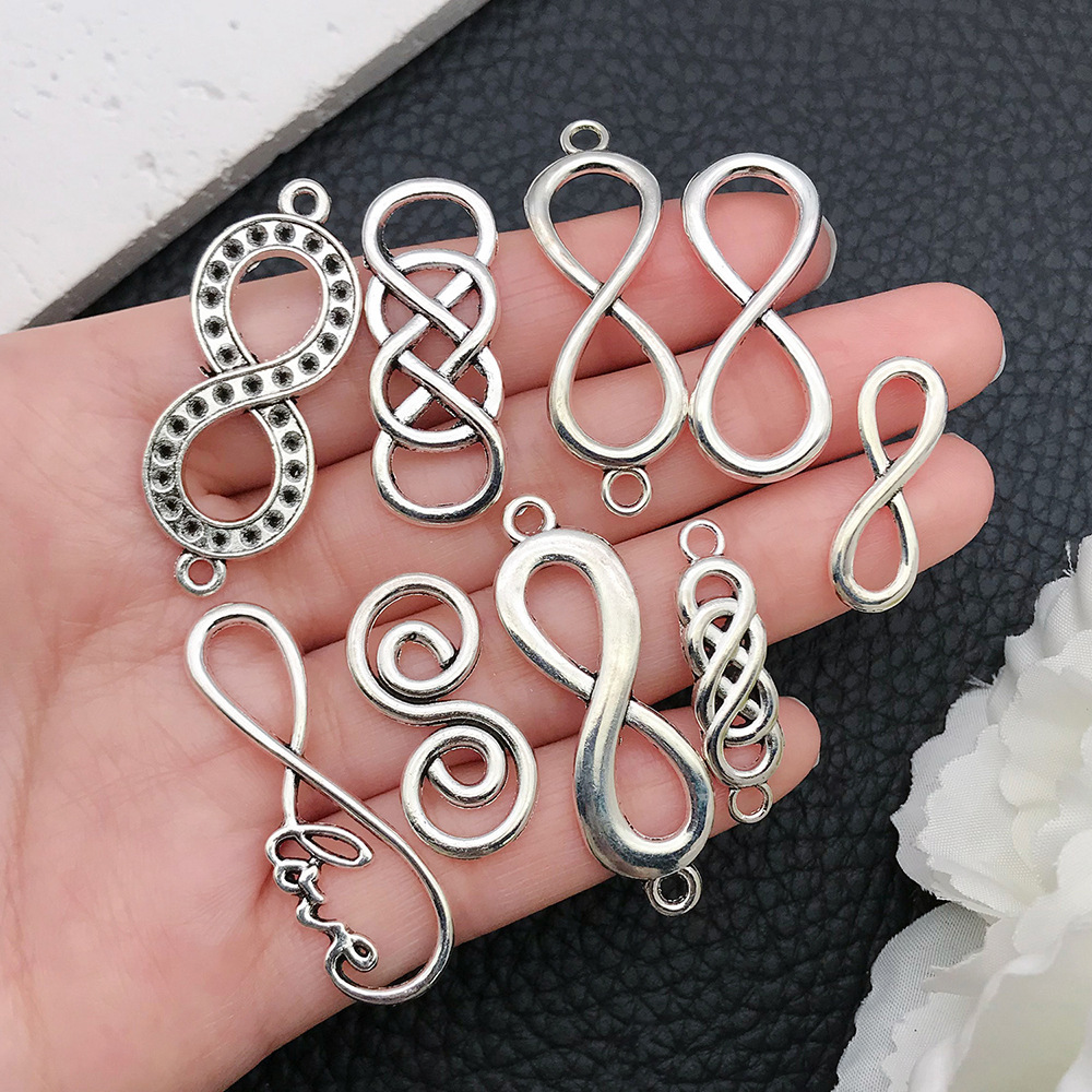 20 個アンティーク銀色ヴィンテージ無限大シンボルコネクタチ - Vintage Fashion Finds のレビューと価格