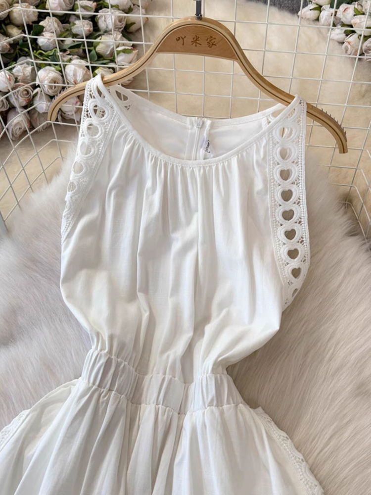 エレガントな中空アウト女性白ドレスノースリーブ O ネック  - Vintage Fashion Korea のレビューと価格